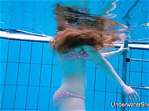 cool woman flashes magnificent body underwater