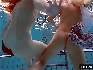 sizzling Russian nymphs swimming in the pool
